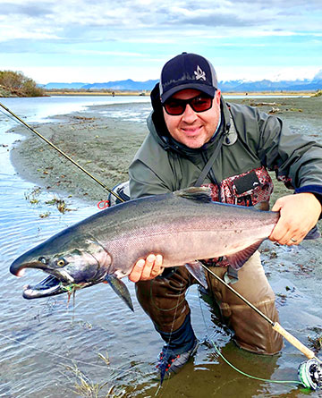 A coho salmon caught during an Alaska fshing trip